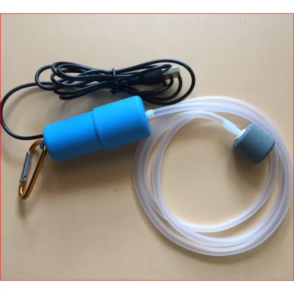 27442063133ab0a9d7300aa88932ff1e.webp Portable Mini USB Aquarium Fish Tank Oxygen Air Pump Mute